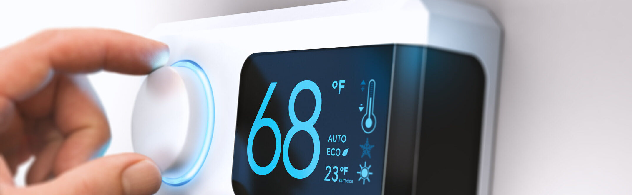 Hand turning a home thermostat knob to set temperature on energy saving mode. fahrenheit units. Composite image between a photography and a 3D background.